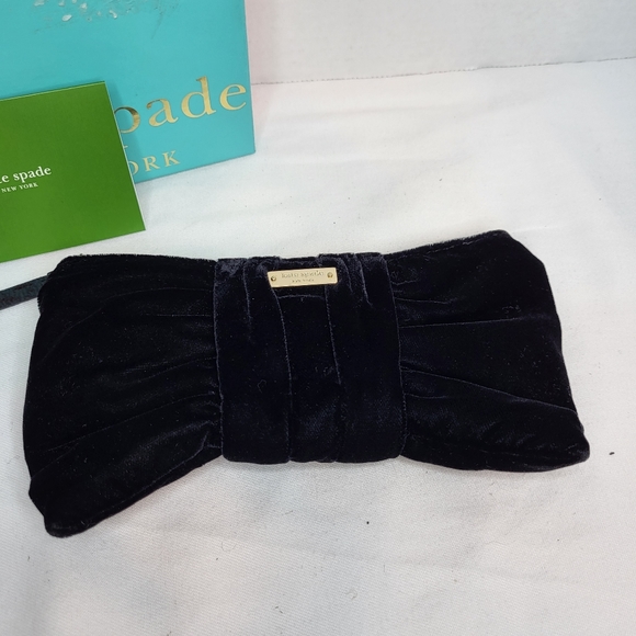 Kate Spade small rosalie deluxe black plush with gold zipper and white interior